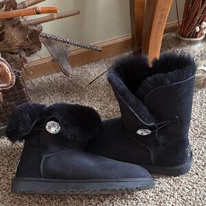 UGG Black Sheepskin Winter Boots with large rhinestone.